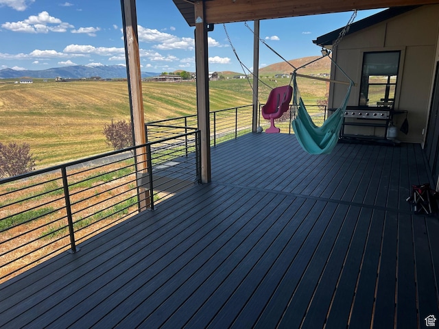 2346 Lake Cir, Preston, ID 83263 - deck featuring a view of rural / pastoral area, a mountain view, and a lawn