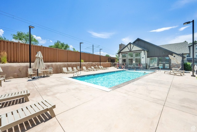 10376 S Beetdigger Blvd, Sandy, UT 84070 - community pool featuring a patio area
