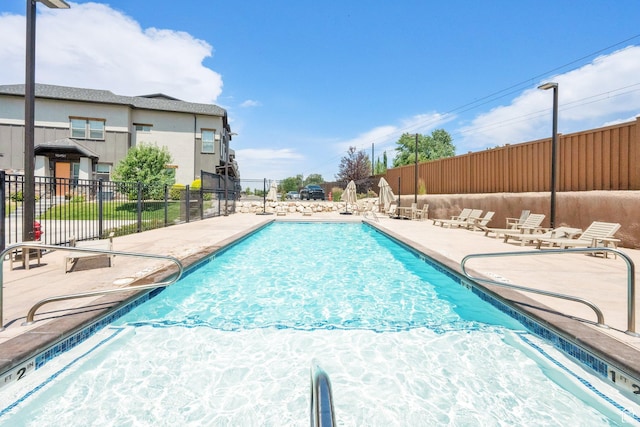 10376 S Beetdigger Blvd, Sandy, UT 84070 - community pool with a patio