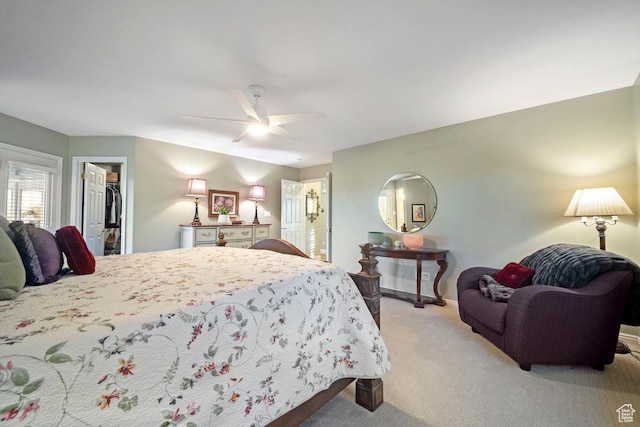 10025 Silver Streak Dr, South Jordan, UT 84095 - bedroom with light carpet, a spacious closet, a closet, and a ceiling fan