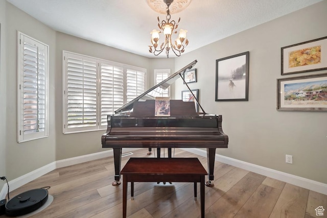 10025 Silver Streak Dr, South Jordan, UT 84095 - living area with a chandelier and light wood finished floors