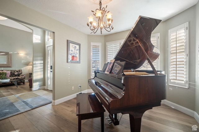 10025 Silver Streak Dr, South Jordan, UT 84095 - sitting room with wood finished floors and a chandelier