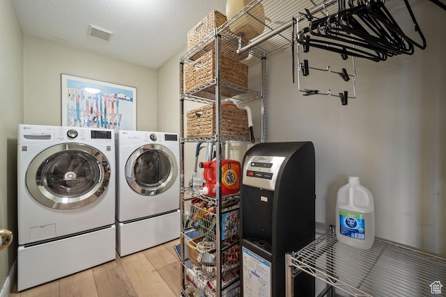 10025 Silver Streak Dr, South Jordan, UT 84095 - laundry room with washing machine and dryer and wood-type flooring