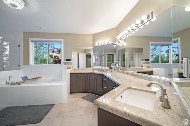 10025 Silver Streak Dr, South Jordan, UT 84095 - bathroom featuring vanity, a bath, plenty of natural light, and tile patterned floors
