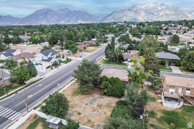 8614 S Buena Vista Dr E, Sandy, UT 84094 - aerial perspective of suburban area with a mountainous background