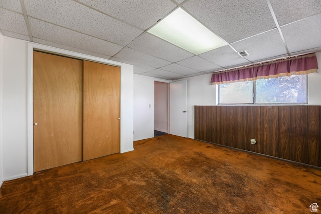 8614 S Buena Vista Dr E, Sandy, UT 84094 - unfurnished bedroom with a drop ceiling, a closet, and carpet floors