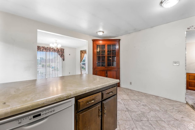 8614 S Buena Vista Dr E, Sandy, UT 84094 - kitchen featuring dishwashing machine, a chandelier, and dark brown cabinetry