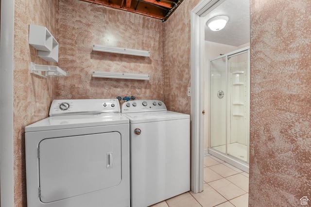 8614 S Buena Vista Dr E, Sandy, UT 84094 - laundry area with washer and clothes dryer and light tile patterned flooring