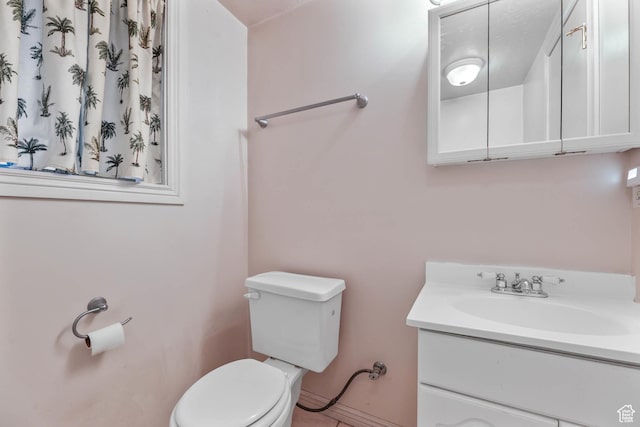 8614 S Buena Vista Dr E, Sandy, UT 84094 - bathroom with toilet and vanity