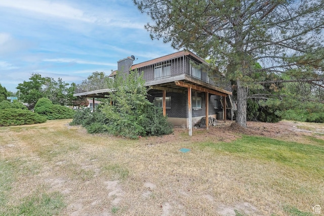 8614 S Buena Vista Dr E, Sandy, UT 84094 - rear view of property featuring a deck and a chimney