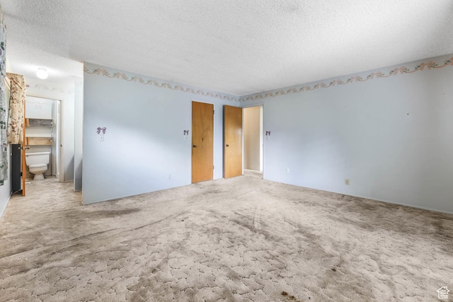 8614 S Buena Vista Dr E, Sandy, UT 84094 - unfurnished room with a textured ceiling and carpet floors