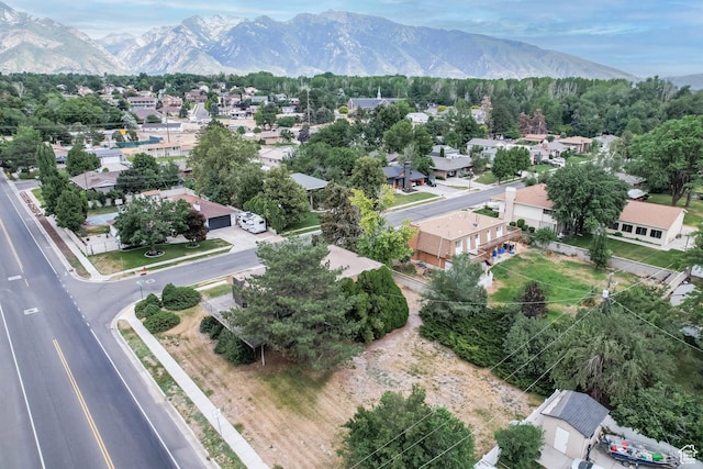 8614 S Buena Vista Dr E, Sandy, UT 84094 - aerial perspective of suburban area with a mountainous background