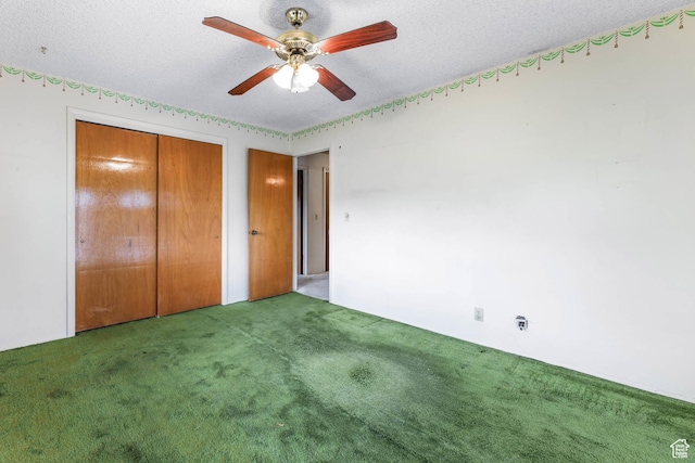 8614 S Buena Vista Dr E, Sandy, UT 84094 - unfurnished bedroom with carpet flooring, a closet, a textured ceiling, and a ceiling fan