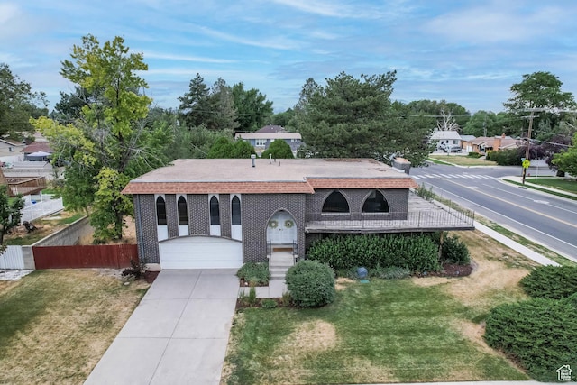 8614 S Buena Vista Dr E, Sandy, UT 84094 - view of front facade featuring concrete driveway and brick siding
