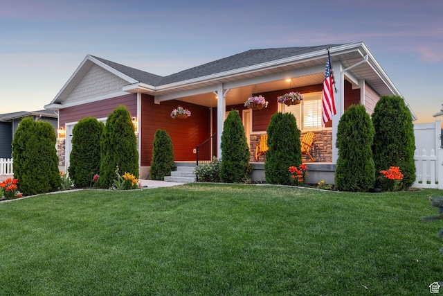 644 E 780 S, Heber City, UT 84032 - view of front of home featuring a garage, stone siding, and a porch