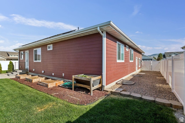 644 E 780 S, Heber City, UT 84032 - view of property exterior featuring a fenced backyard, a gate, and a garden