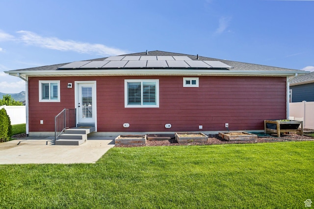 644 E 780 S, Heber City, UT 84032 - rear view of house featuring solar panels and a garden