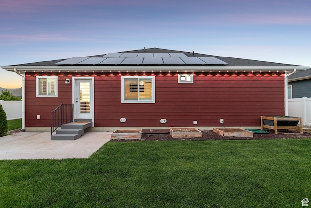 644 E 780 S, Heber City, UT 84032 - rear view of property featuring solar panels, a patio, and a shingled roof
