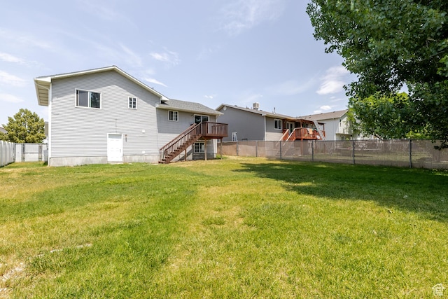 364 W 1330 N, Logan, UT 84341 - back of property with stairway, a deck, and a fenced backyard