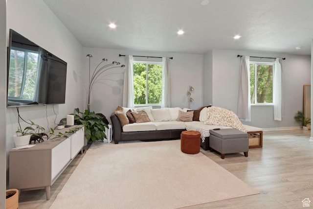 1288 Lincoln Ave, Ogden, UT 84404 - living room with healthy amount of natural light, light wood-style floors, and recessed lighting