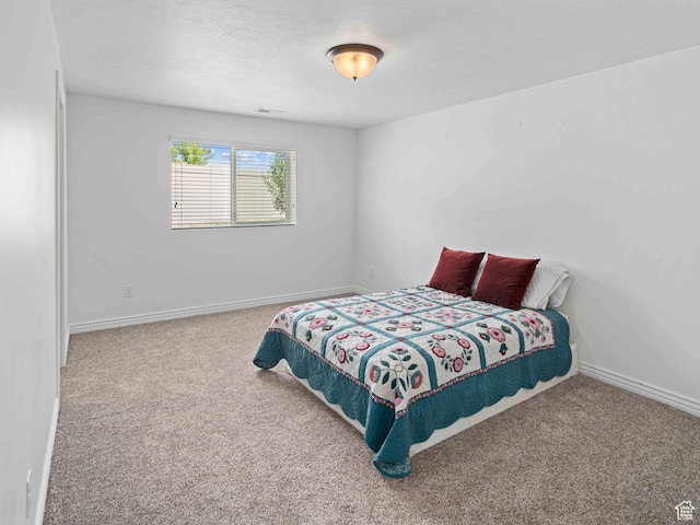 3552 S 5250 W Unit 13, Hooper, UT 84315 - carpeted bedroom with baseboards and a textured ceiling
