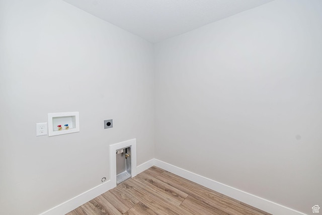 318 E 290 N, Preston, ID 83263 - laundry area featuring electric dryer hookup, washer hookup, light wood-style flooring, and hookup for a gas dryer