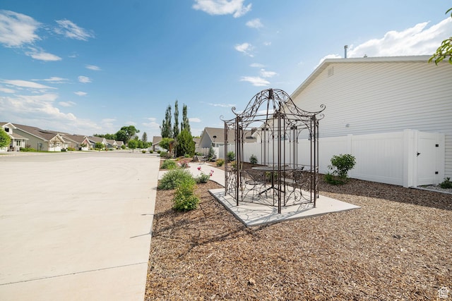 318 E 290 N, Preston, ID 83263 - view of yard featuring a residential view and a patio area