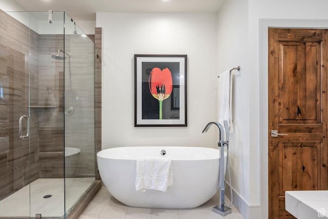 538 W Heritage Way, Heber City, UT 84032 - bathroom with a soaking tub, a shower stall, and tile patterned flooring