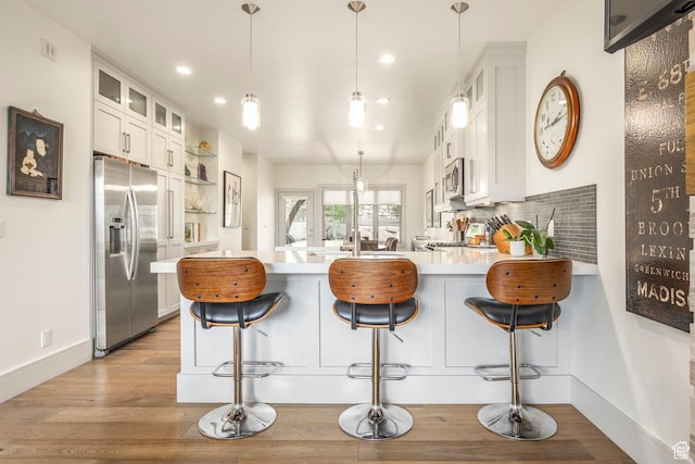 538 W Heritage Way, Heber City, UT 84032 - kitchen featuring appliances with stainless steel finishes, a peninsula, light countertops, white cabinetry, and open shelves