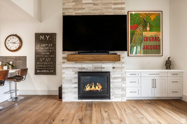 538 W Heritage Way, Heber City, UT 84032 - living room with light wood-type flooring and a fireplace