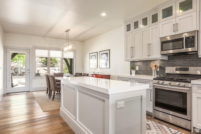 538 W Heritage Way, Heber City, UT 84032 - kitchen featuring stainless steel appliances, a kitchen island, light countertops, a chandelier, and recessed lighting