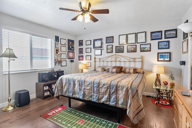 6446 S 4160 W, Taylorsville, UT 84129 - bedroom featuring wood finished floors, a textured ceiling, and ceiling fan
