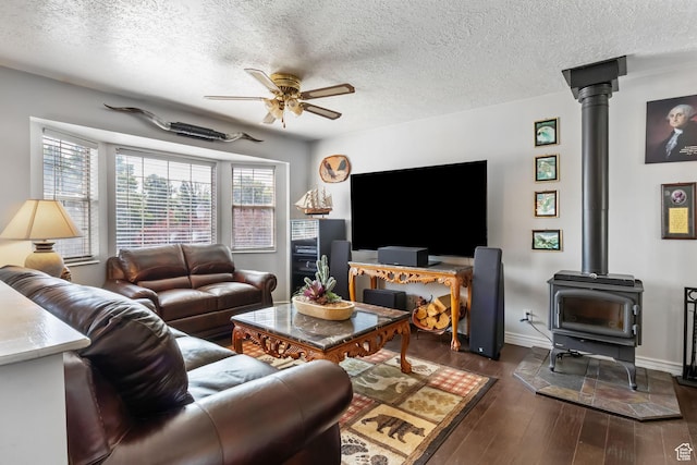 6446 S 4160 W, Taylorsville, UT 84129 - living area with ceiling fan, a textured ceiling, dark wood finished floors, and a wood stove