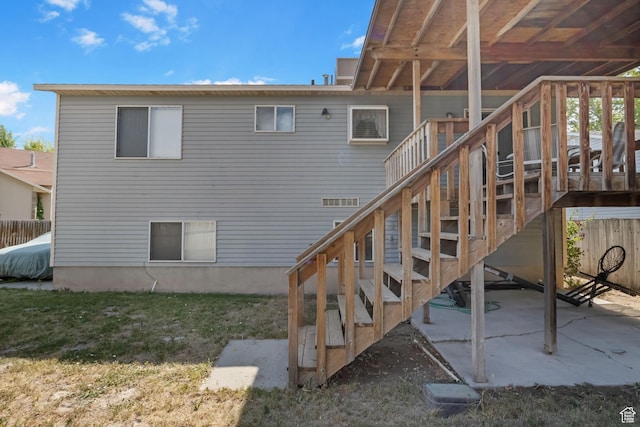 6446 S 4160 W, Taylorsville, UT 84129 - rear view of house with stairway and a patio