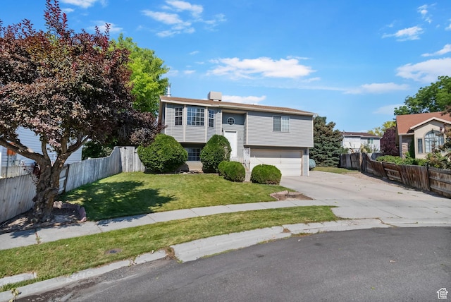 6446 S 4160 W, Taylorsville, UT 84129 - split foyer home featuring driveway and a garage