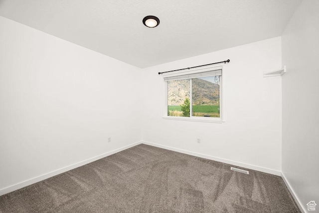 496 S 1600 E, Hyrum, UT 84319 - carpeted spare room featuring baseboards