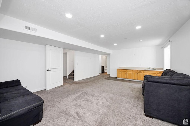 496 S 1600 E, Hyrum, UT 84319 - carpeted living area with recessed lighting and stairway