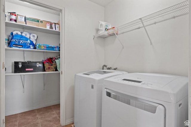 141 W Suncrest Ln, Saratoga Springs, UT 84045 - laundry area featuring washer and dryer and light tile patterned floors