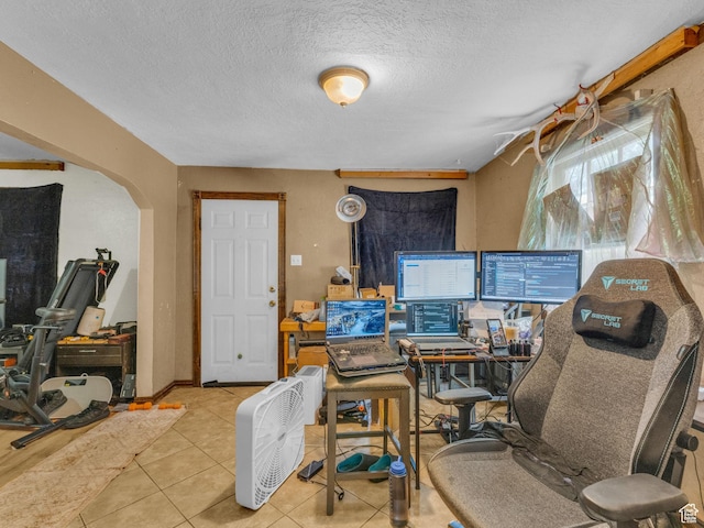 4104 S 300 E, Millcreek, UT 84107 - office area featuring arched walkways, tile patterned flooring, and a textured ceiling