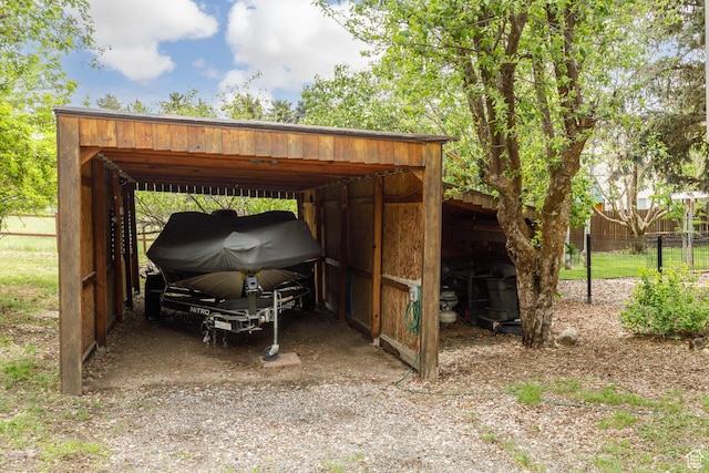 3250 N River Dr, Eden, UT 84310 - view of parking / parking lot featuring a carport