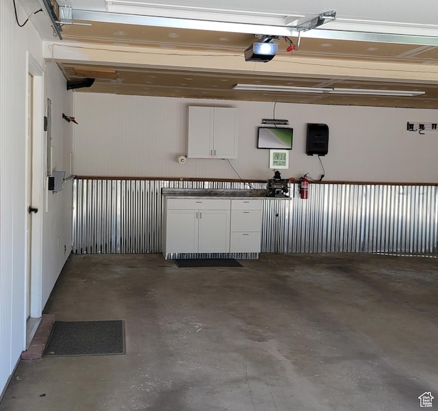 3250 N River Dr, Eden, UT 84310 - garage featuring a garage door opener