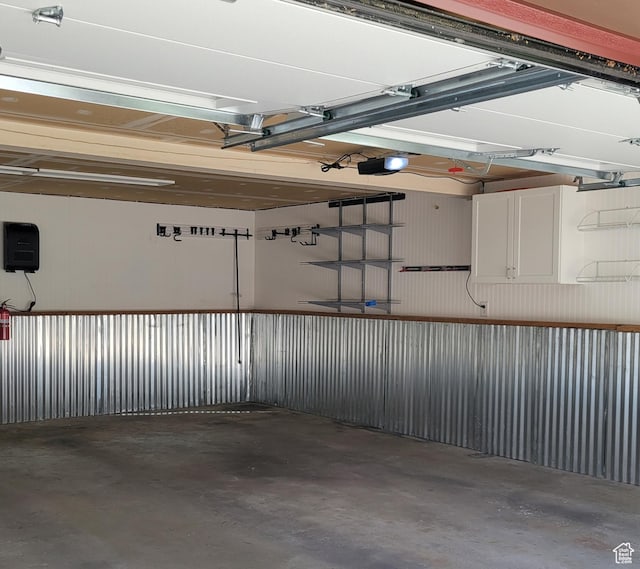 3250 N River Dr, Eden, UT 84310 - garage featuring a garage door opener