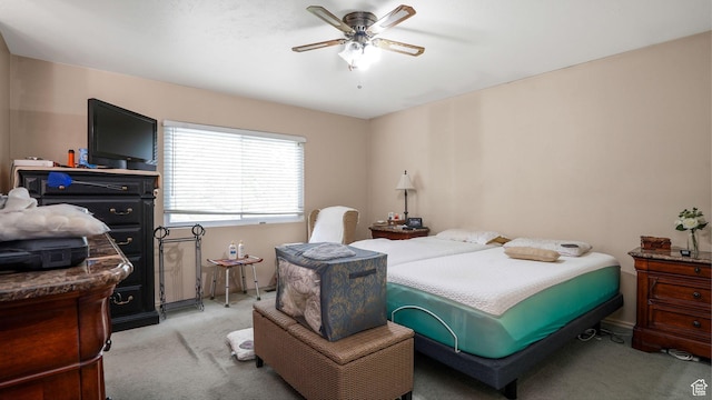 7488 S Blackfriar Cir, West Jordan, UT 84084 - bedroom with light colored carpet and ceiling fan