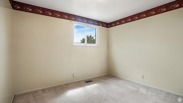 7488 S Blackfriar Cir, West Jordan, UT 84084 - spare room featuring carpet