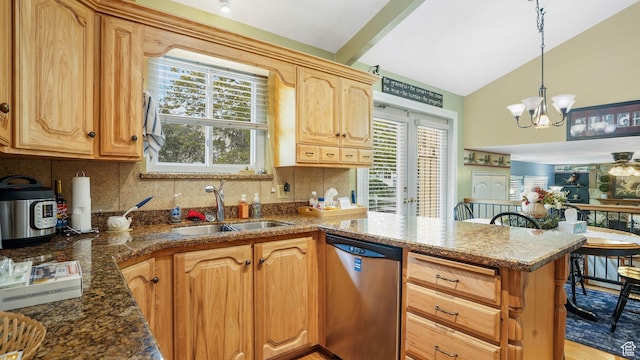 7488 S Blackfriar Cir, West Jordan, UT 84084 - kitchen with stainless steel dishwasher, a peninsula, tasteful backsplash, a chandelier, and pendant lighting