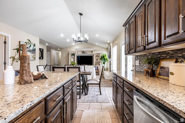 9768 N 5520 W, Highland, UT 84003 - kitchen with stainless steel dishwasher, tasteful backsplash, open floor plan, light stone counters, and dark brown cabinets