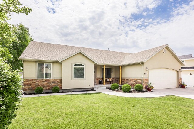 9768 N 5520 W, Highland, UT 84003 - ranch-style house featuring stone siding, stucco siding, covered porch, a garage, and concrete driveway
