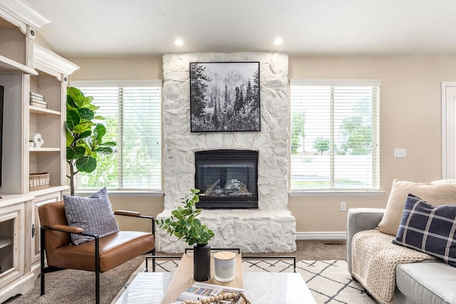 9768 N 5520 W, Highland, UT 84003 - living room featuring a fireplace, plenty of natural light, carpet floors, and recessed lighting