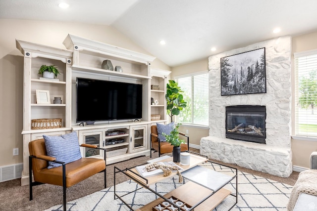 9768 N 5520 W, Highland, UT 84003 - carpeted living area with lofted ceiling, a fireplace, and recessed lighting