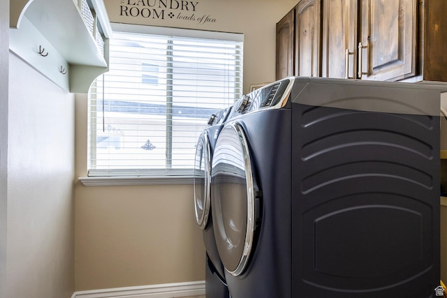 9768 N 5520 W, Highland, UT 84003 - laundry area with cabinet space and washing machine and dryer